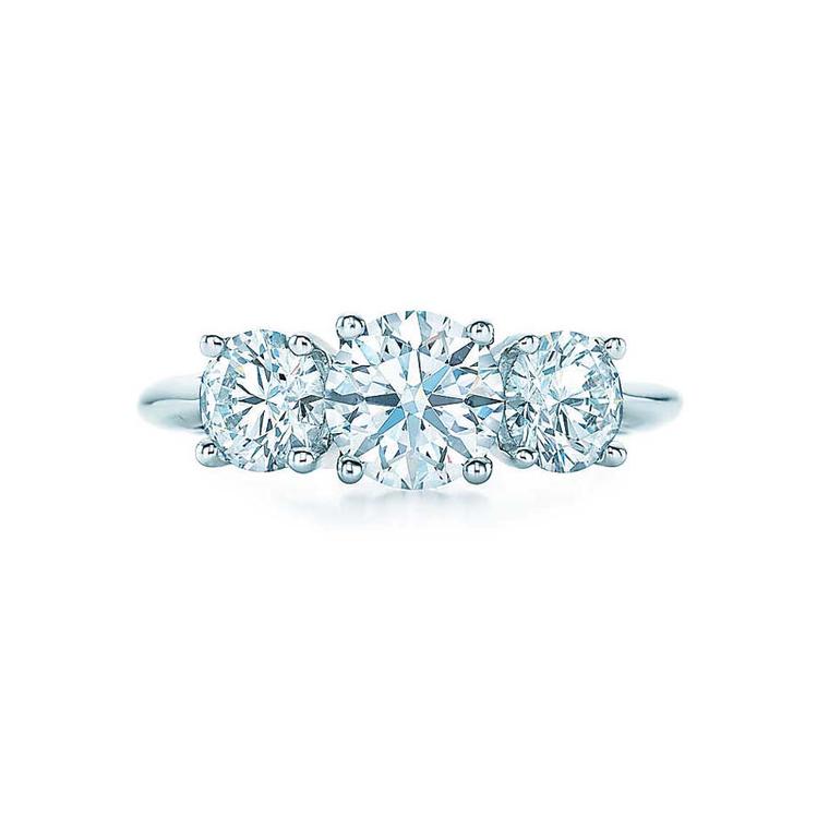 Tiffany & Co.'s three stone engagement ring is a classic design featuring three round brilliant diamonds perfectly matched for colour, quality and proportion.